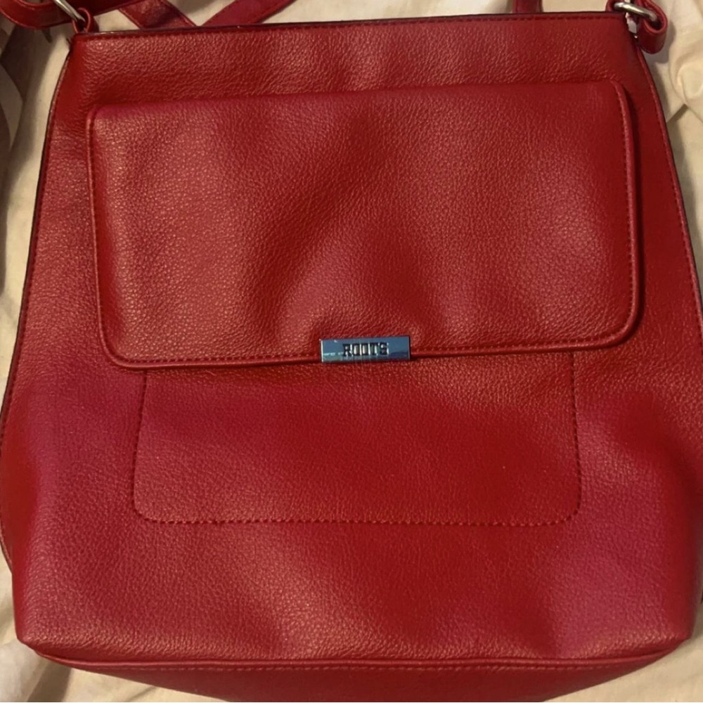 BEAUTIFUL red vintage roots messenger bag